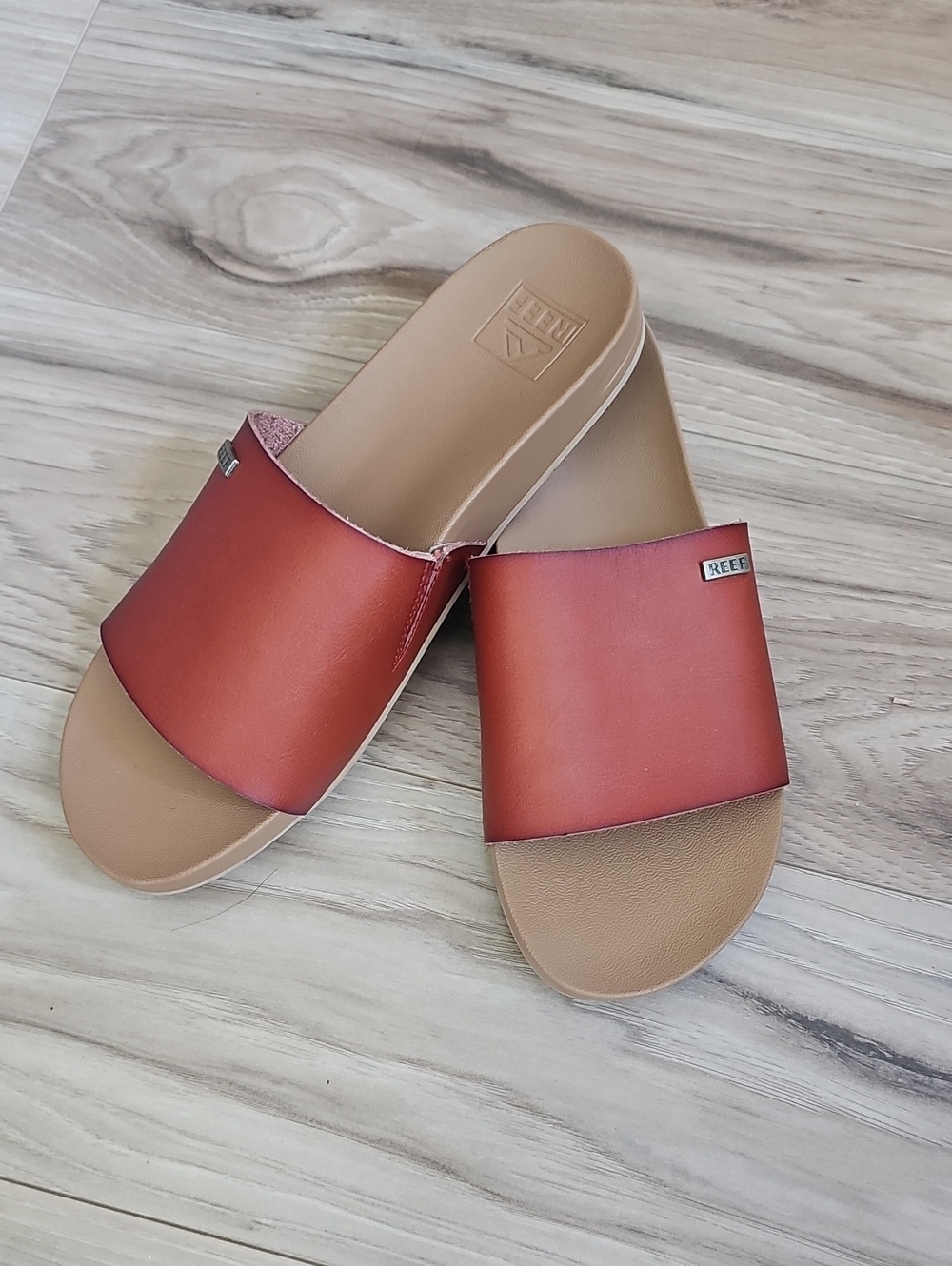 Reef Women’s Rust Red Slide Sandals